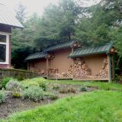 Privacy screen, and firewood shed.